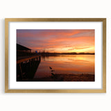 Extra large abstract art print depicting textured scenery of Alabama, in muted earth tones, framed in gold.