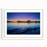 Abstract art print of Arkansas scenery in muted greens and blues, framed with a white mat, suitable for dining room decor.