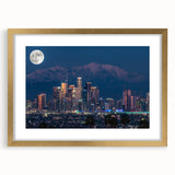 Extra large abstract art print of Los Angeles skyline in muted gold and blue tones on a textured canvas.