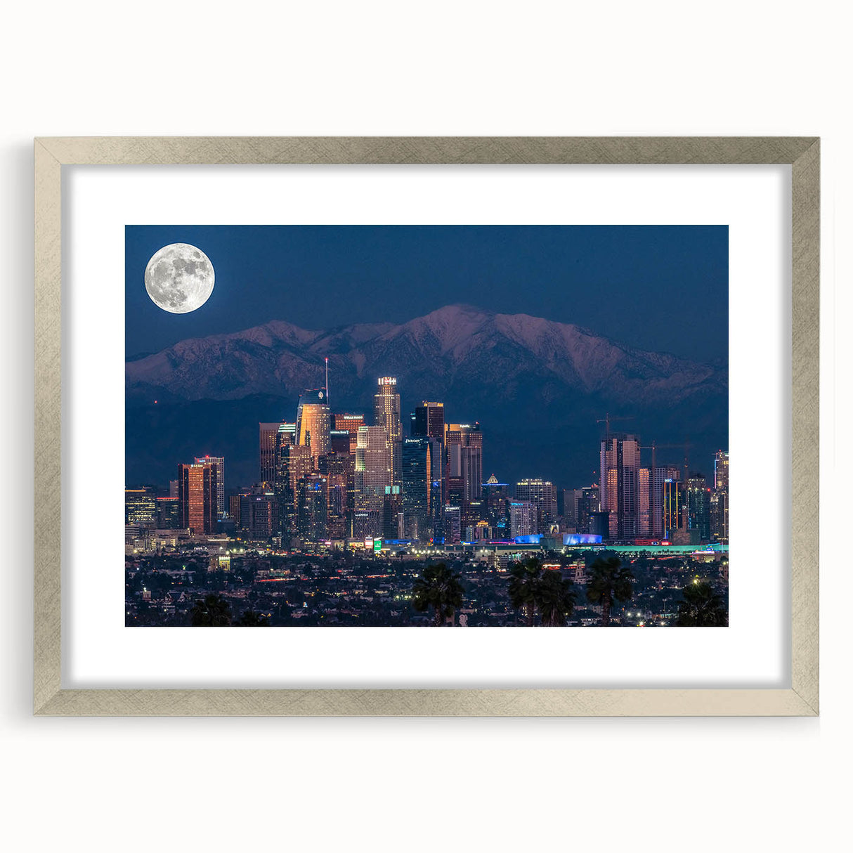 Textured art print of abstract Los Angeles skyline in muted gray and blue tones, framed in silver.