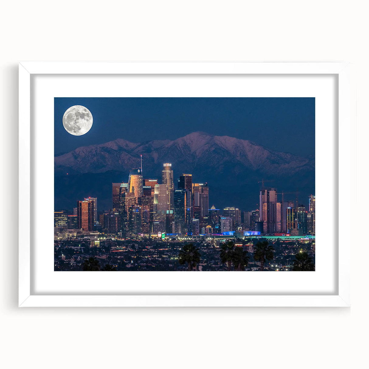 Abstract art print of Los Angeles skyline in muted blue and gray tones on a framed white mat, ideal for dining room decor.