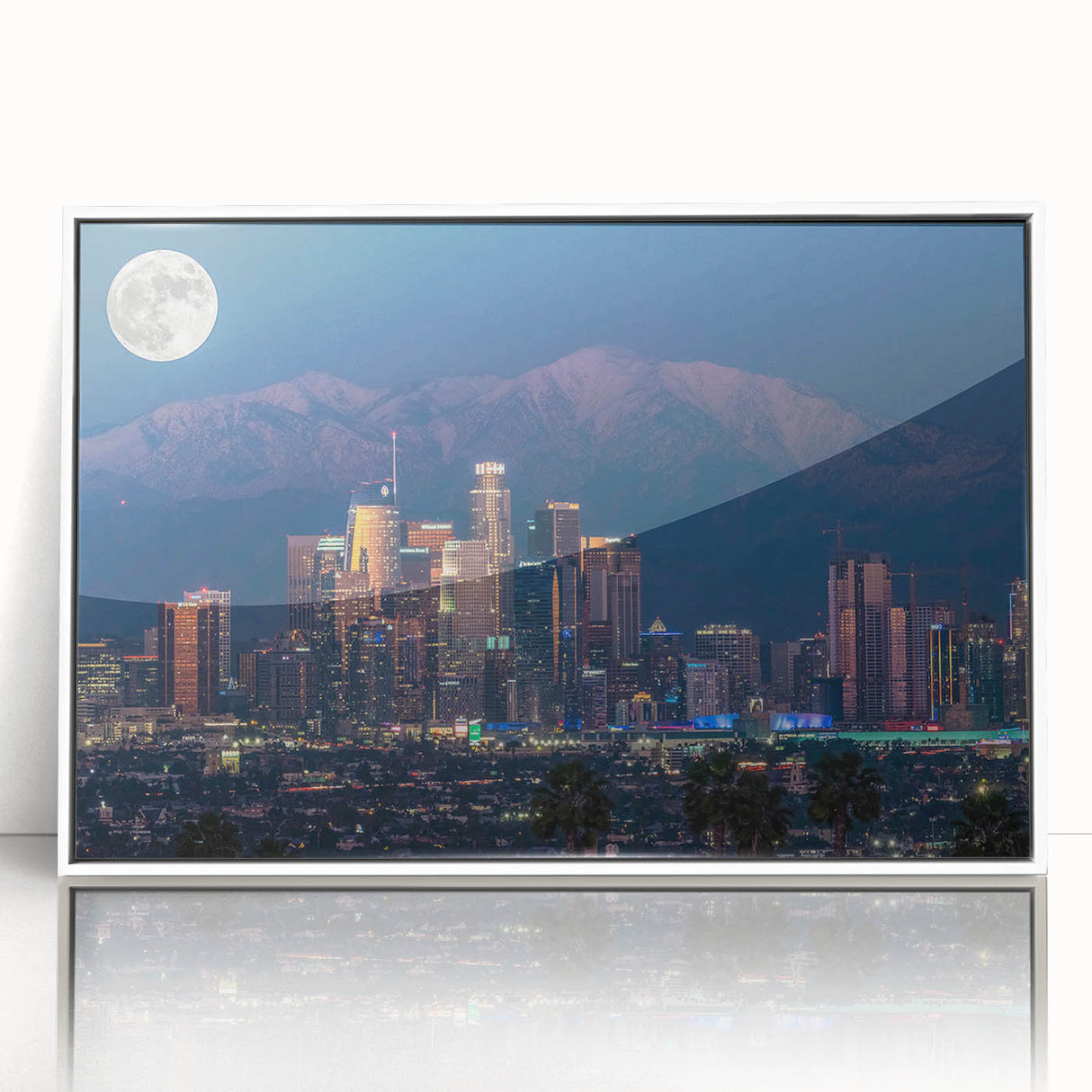 Acrylic print of Los Angeles skyline in art deco style with muted pastel palette, framed in white.