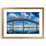 Extra large abstract art print of San Diego scenery in vibrant hues, framed in gold, ideal for living room decor.