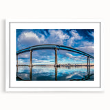 Abstract art print of San Diego scenery in muted blue and beige tones on a framed white canvas.
