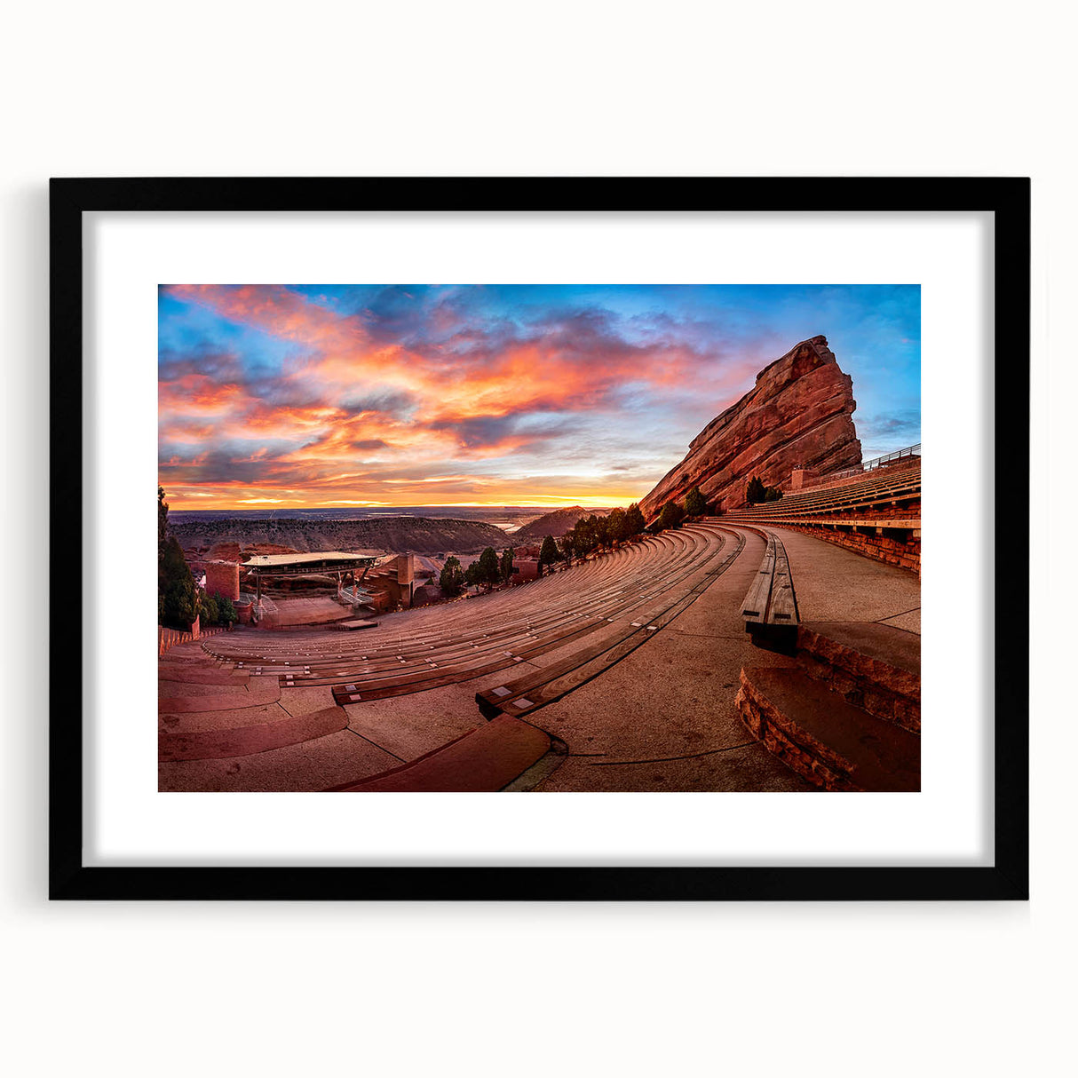 Abstract art print of Denver scenery in vibrant colors on a large canvas, ideal for living room decor.
