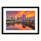 Abstract art print of a vibrant, textured Connecticut scenery in a black frame, ideal for living room decor.