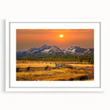 Abstract art print of Idaho scenery in muted earth tones on a framed white mat, ideal for dining room decor.