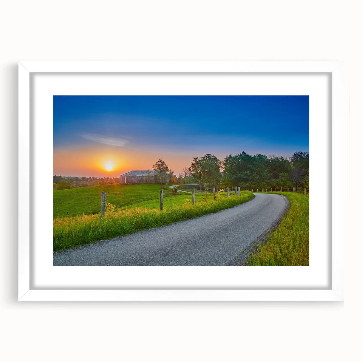 Abstract art print of a Kentucky landscape in muted green and blue tones, framed with a white mat.