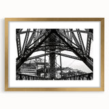 Extra large abstract art print of New Orleans scenery in gold frame, featuring textured brush strokes in earth tones.