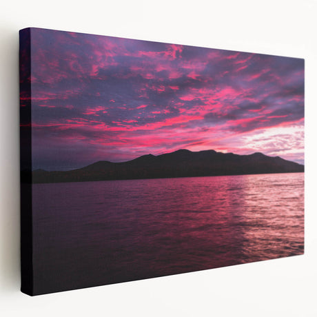 Scenic Maine coastline depicted on a large stretched canvas, featuring muted blues and grays, suitable for kitchen wall art.