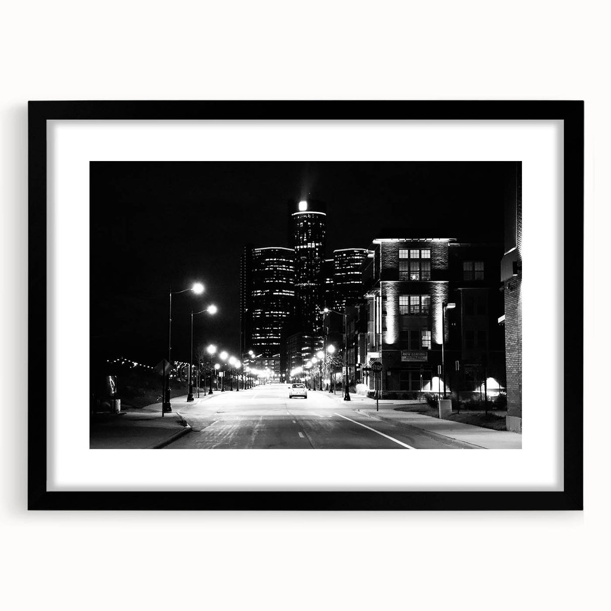 Extra large abstract art print of colorful, textured Detroit skyline on framed black mat, ideal for living room decor.