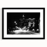 Extra large abstract art print of colorful, textured Detroit skyline on framed black mat, ideal for living room decor.