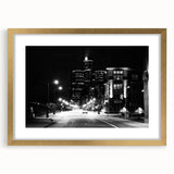 Extra large abstract art print of Detroit skyline in textured shades of blue and gray on a gold-framed canvas.