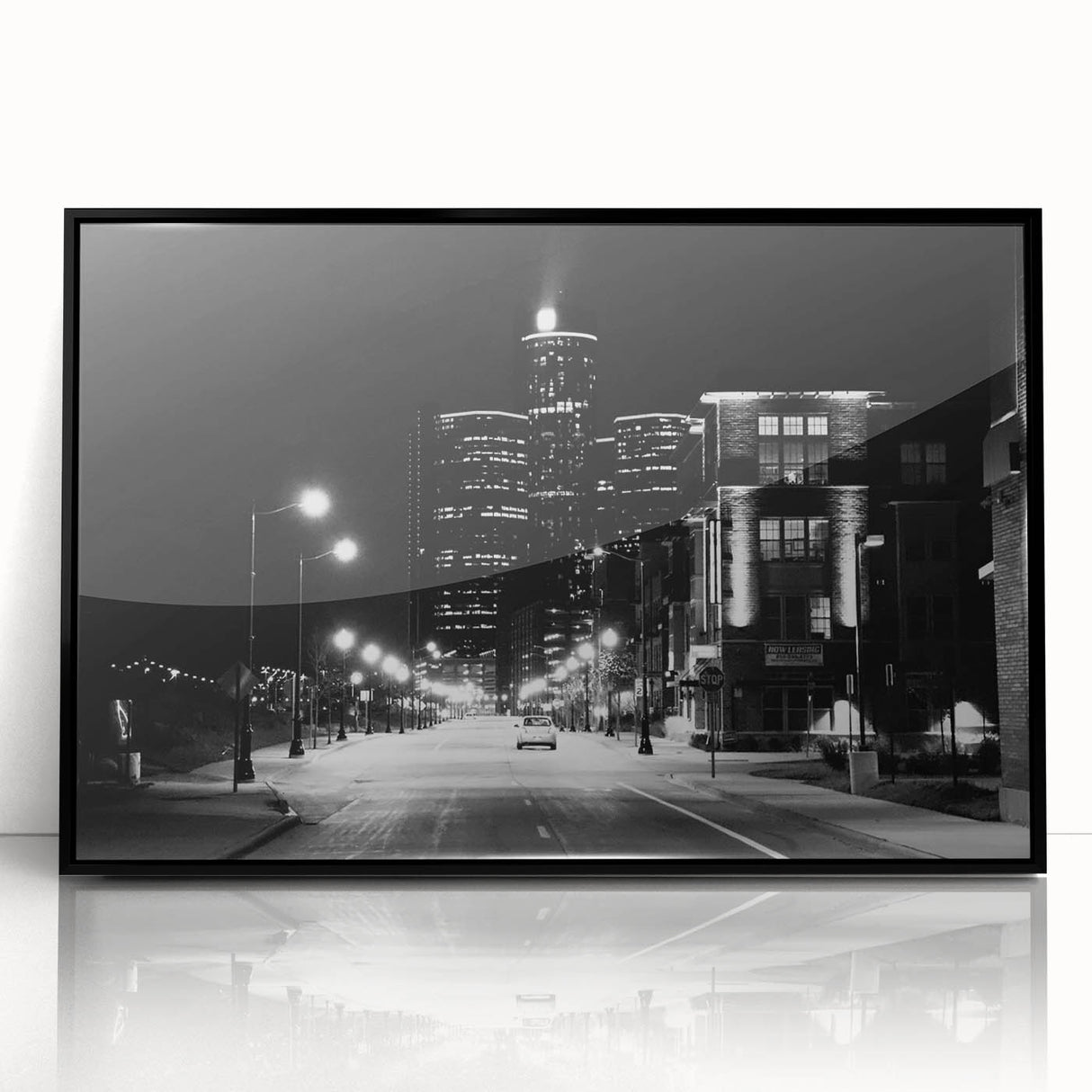 Large abstract wall art depicting Detroit skyline in muted gray tones on a black framed acrylic.