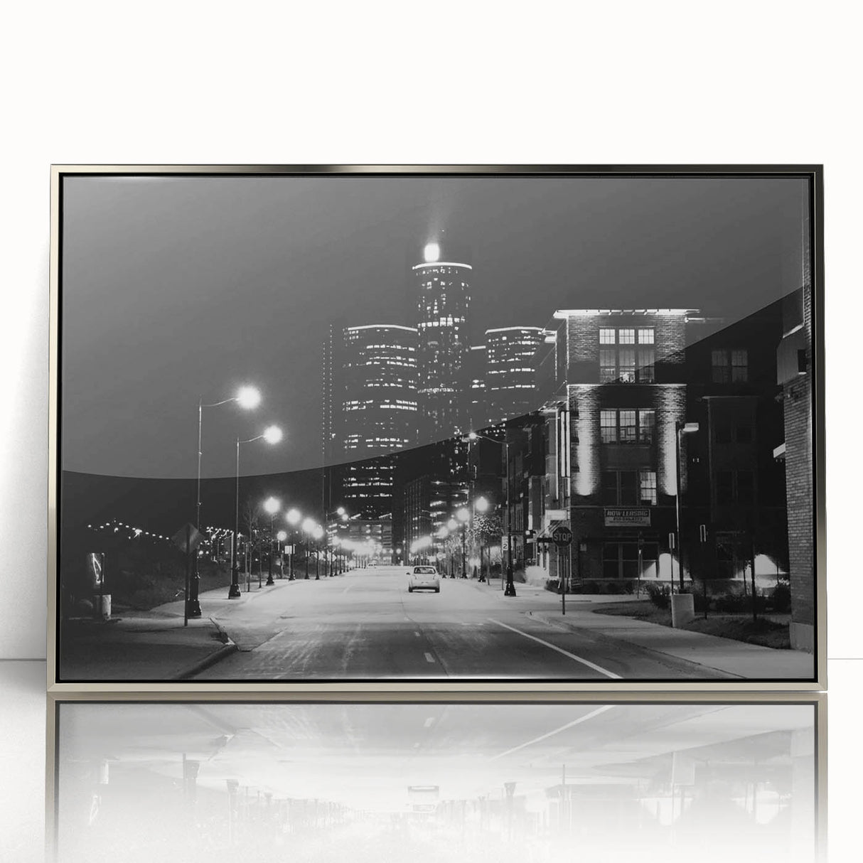 Mid-century modernist art of Detroit skyline in muted silver and blue hues on framed acrylic.