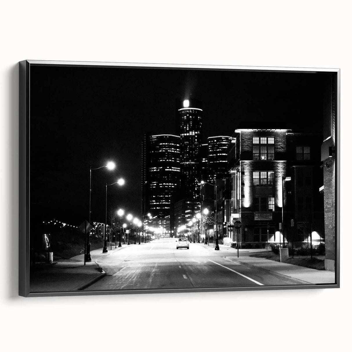 Black and white framed canvas of Detroit landscape, ideal for bedroom wall decor.
