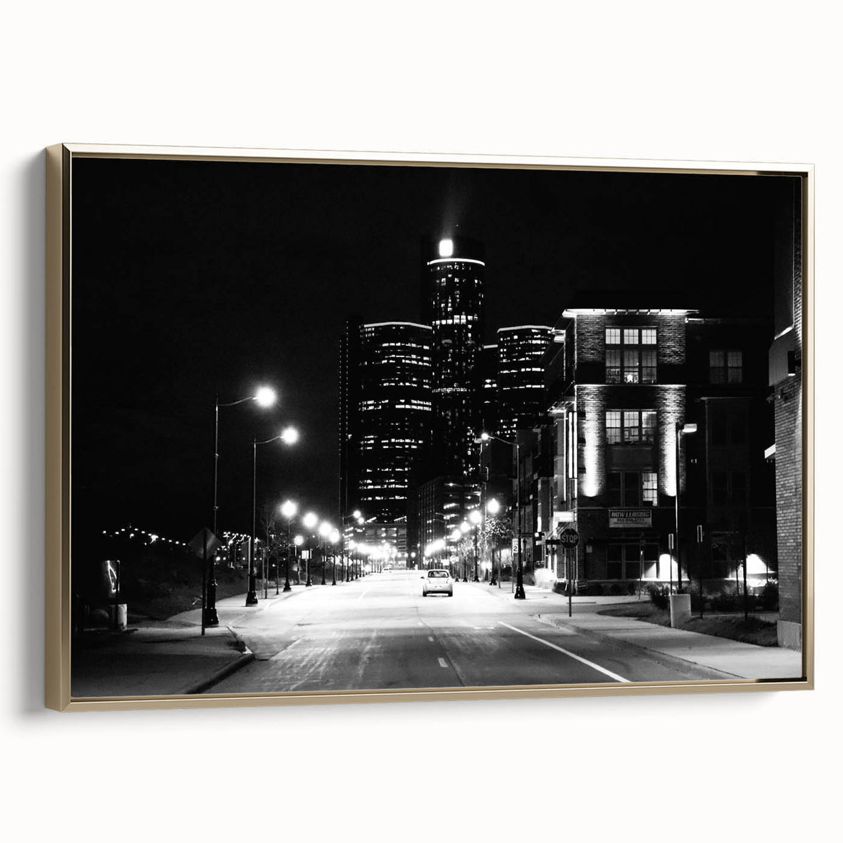 Framed canvas depicting vintage-style Detroit landscape in black and gold tones, suitable for bedroom wall art.