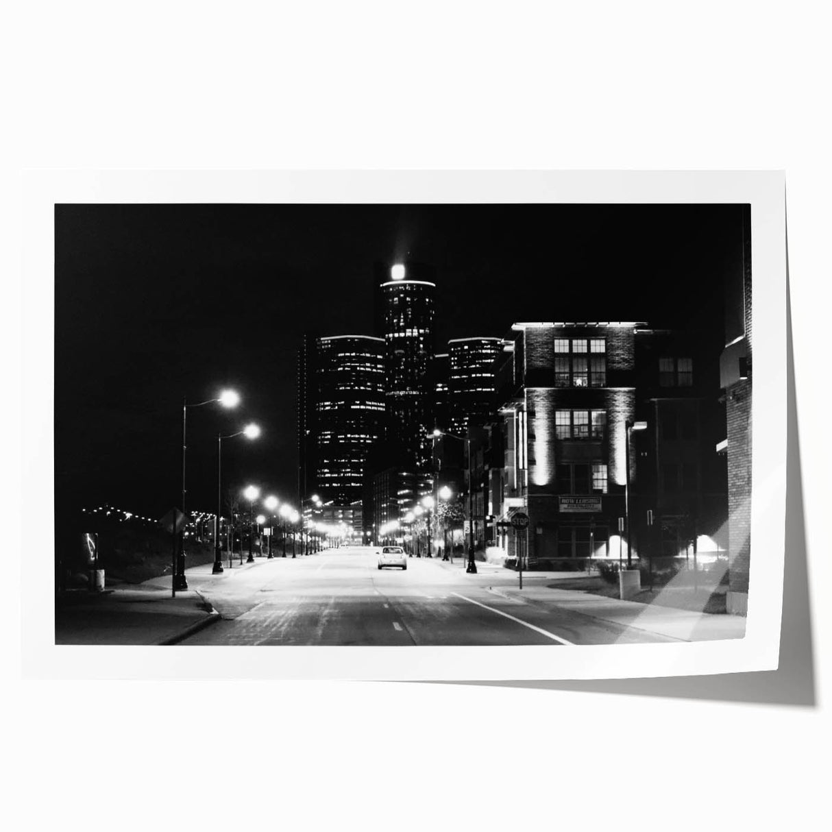 Extra large rolled print of Detroit skyline in muted gray and blue tones, ideal for art wall in dining room.