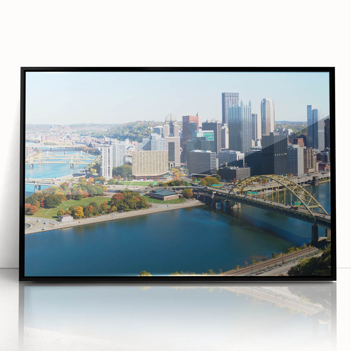Large abstract wall art of Pittsburgh skyline in muted gray and blue tones on framed acrylic, ideal for modern office decor.