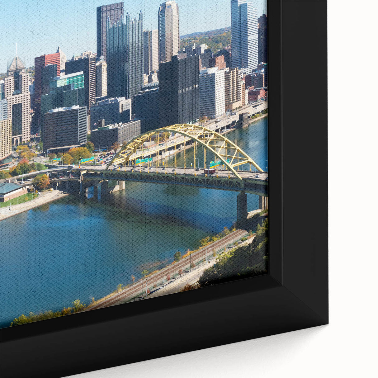 Extra large framed canvas featuring a textured depiction of the Pittsburgh skyline in black with colorful accents.