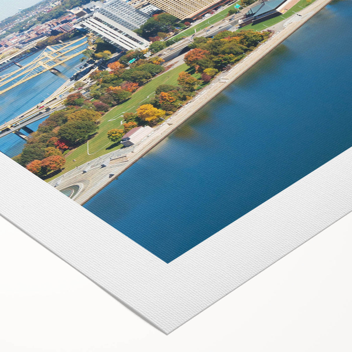 Art deco poster of Pittsburgh skyline in muted gray and blue tones on rolled canvas, suitable for dining room wall art.
