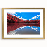 Extra large wall art depicting an abstract Vermont landscape in textured gold and green tones, framed with a gold mat.