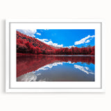 Abstract art print depicting a serene Vermont landscape in muted green and blue tones, framed with a white mat.