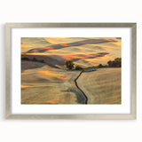 Textured art of abstract Palouse scenery in muted earth tones, framed in silver, ideal for bedroom wall decor.