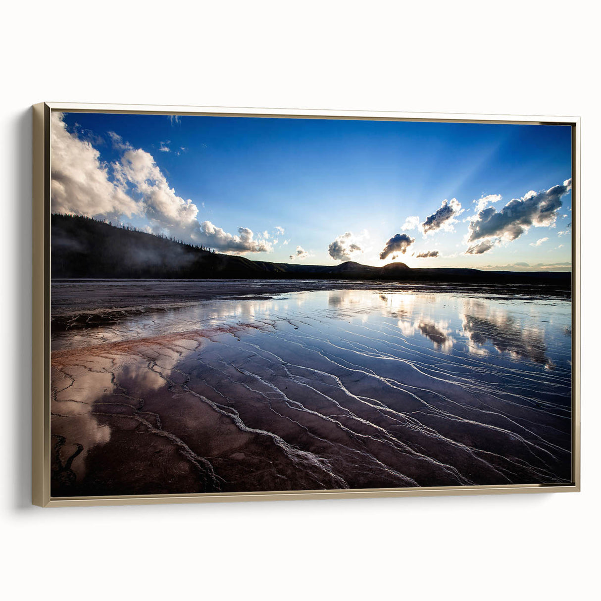 Framed canvas depicting Yellowstone landscape in vintage poster style, with muted earth tones, ideal for bedroom wall art.