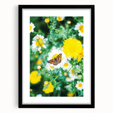 Abstract art print featuring textured, colorful swirls on a large canvas, framed in black, ideal for living room decor.