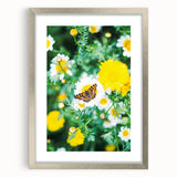 Textured art depicting abstract spring themes in soft green and yellow on a silver-framed canvas, ideal for bedroom decor.