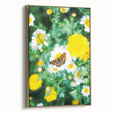 Framed canvas featuring a vintage-style landscape painting of spring, with muted green and gold tones.