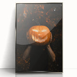 Mid-century modernist art depicting autumn trees in warm orange and red tones on a silver-framed acrylic print.