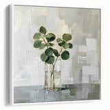 Framed canvas wall art showcasing an abstract floral design in vibrant colors, displayed against a white background, highlighting its modern aesthetic.
