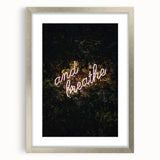 Textured abstract art print in warm orange and red tones on a silver framed canvas, suitable for bedroom decor.