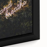 Extra large framed canvas featuring textured, colorful art of autumn trees with black background.