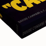 Large art of a black and white landscape painting on stretched canvas, featuring rolling hills and sparse trees.