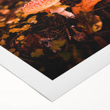 Art deco poster featuring a stylized autumn tree on a rolled canvas, in warm orange and brown tones.