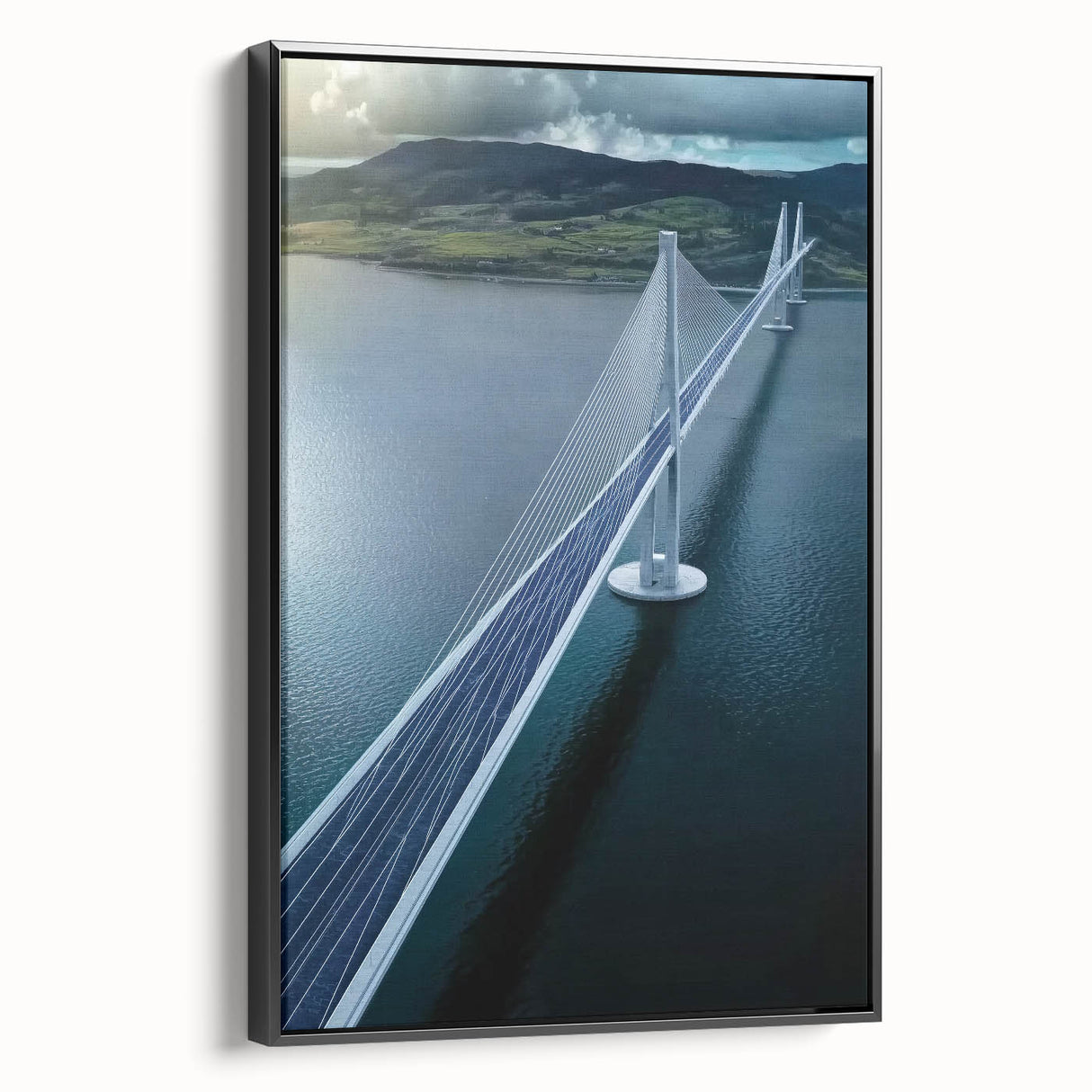 Framed canvas artwork depicting a serene landscape bridge scene, showcasing lush greenery and a tranquil waterway, set against a black frame, ideal for home decor.