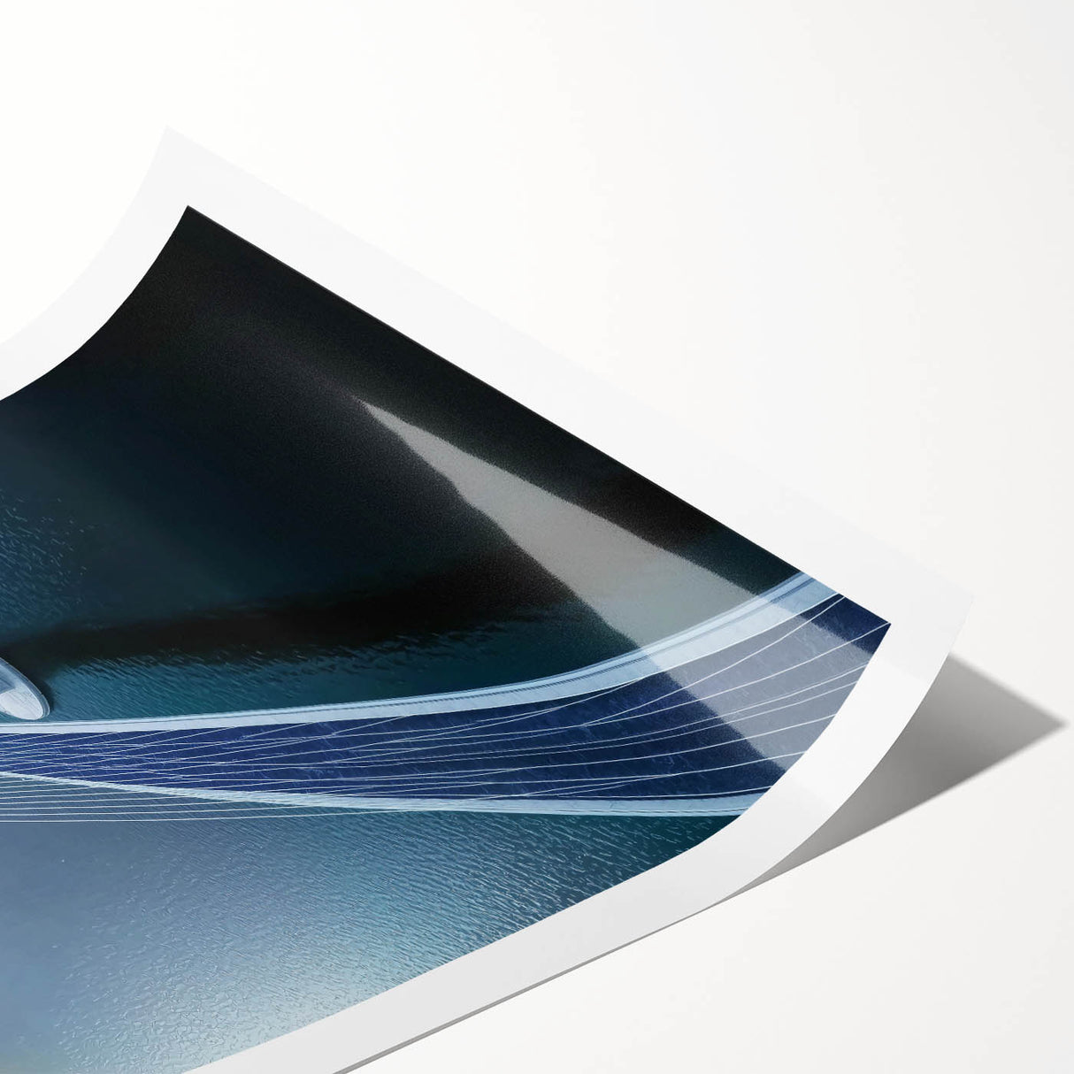Rolled print showcasing a vibrant landscape bridge design, featuring intricate details and rich colors, securely packaged in a protective cardboard tube for easy transport.