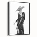 Framed abstract figurative canvas art featuring a striking black design, displayed in a stylish side view, perfect for modern home decor and artistic interiors.