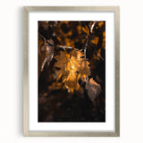 Textured abstract art print depicting autumnal colors on a silver-framed canvas, ideal for bedroom art.