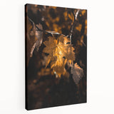 A large canvas print featuring a stylized depiction of fall with orange and brown hues, ideal for kitchen wall art.