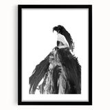 Abstract figurative artwork framed in black, showcasing a modern design with a matte finish. Ideal for contemporary decor, adding elegance to any space.