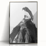 Framed abstract figurative artwork in silver acrylic, showcasing a modern design with flowing shapes and vibrant colors, perfect for contemporary home decor.