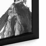 Close-up view of a framed abstract figurative canvas artwork showcasing vibrant colors and intricate details, ideal for modern home decor or gallery settings.