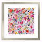 Abstract floral wall art featuring vibrant colors and intricate designs, framed with a silver mat, enhancing modern decor aesthetics in living spaces.
