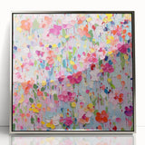 Framed abstract floral wall art featuring vibrant colors and intricate designs, set against a sleek silver frame, perfect for modern home decor.