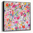 Framed canvas wall art showcasing an abstract floral design in vibrant colors, featuring a sleek black frame, perfect for modern home decor.