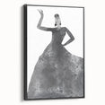 Framed abstract figurative canvas artwork in a modern black frame, showcasing a dynamic design with bold colors and intricate details, ideal for contemporary decor.